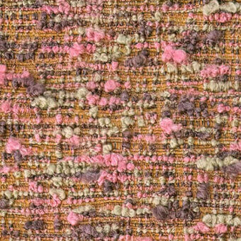 Egoitaliano tweed fabric sample, golden-brown with pink, olive, and plum accents, dense irregular weave with nubby yarn texture.